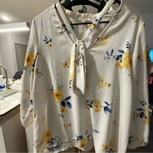 Flowy, cream floral blouse with tie detail